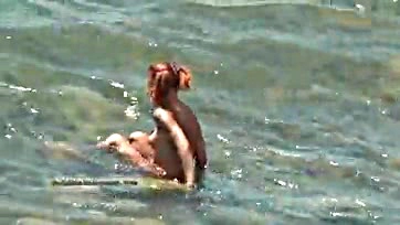 Naked teen naturists frolic in oceanic waters