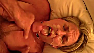 Mature woman gets massive facial, swallows cum, orgasms