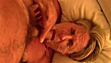 Mature woman gets massive facial, swallows cum, orgasms